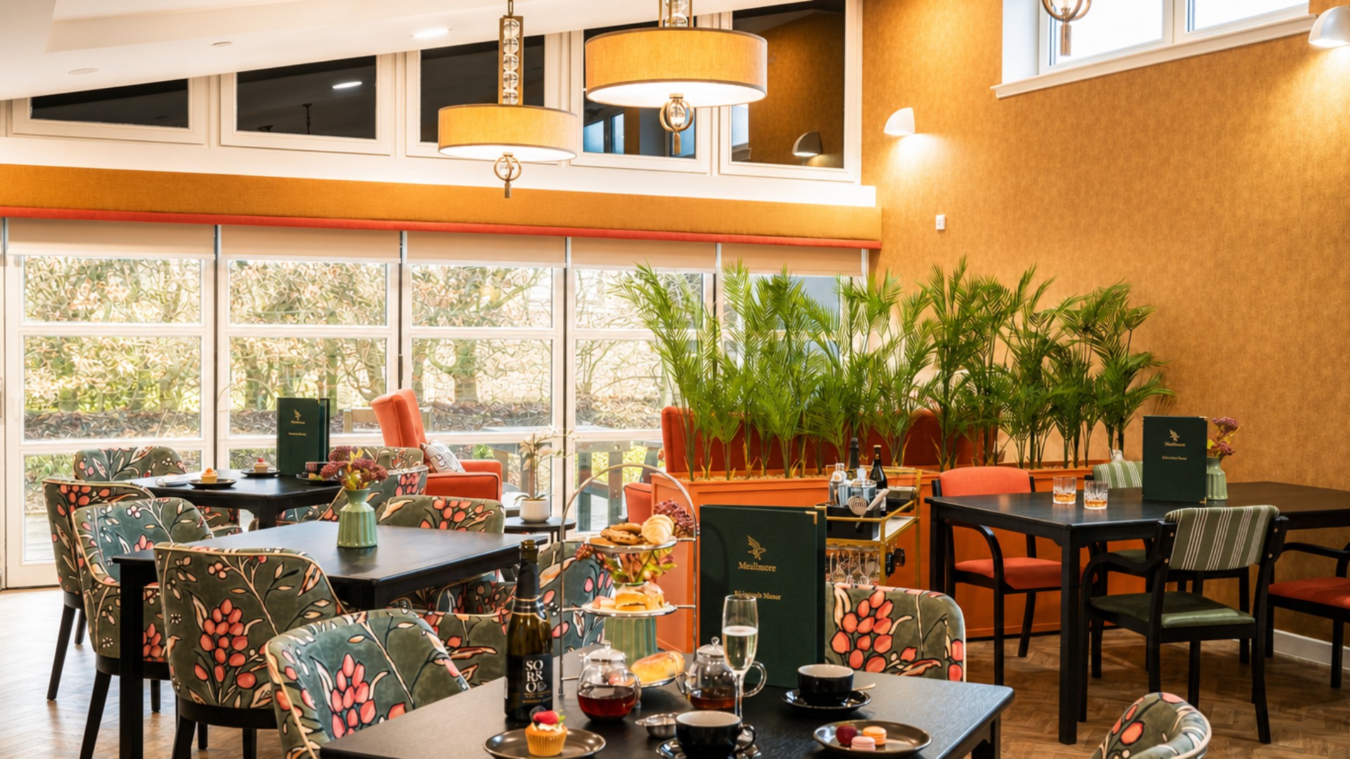 The light-filled cafe and lounge area at Kelvinside Manor Care Home in Glasgow
