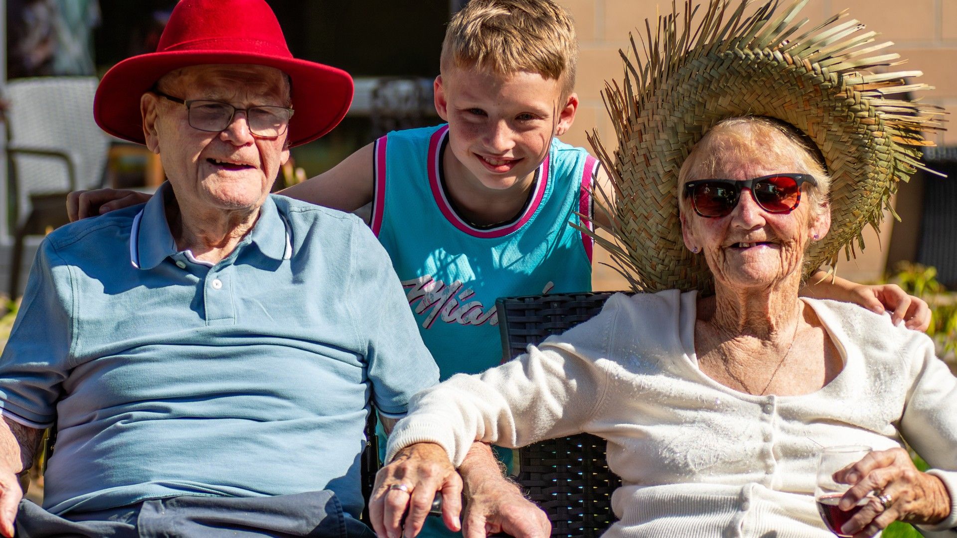 Residents and colleagues enjoying a summer event together at Mearns House Care Home in Newton Mearns