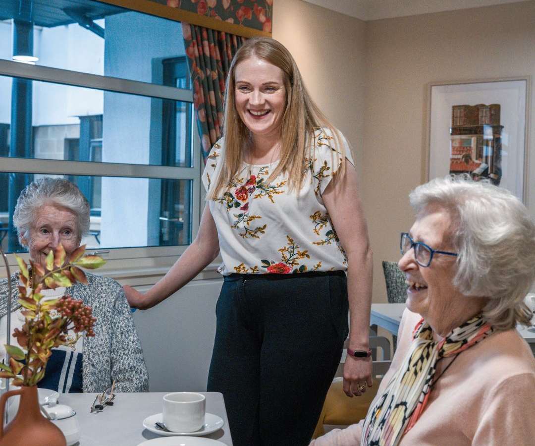 Residents and colleagues enjoying time together at a Meallmore care home